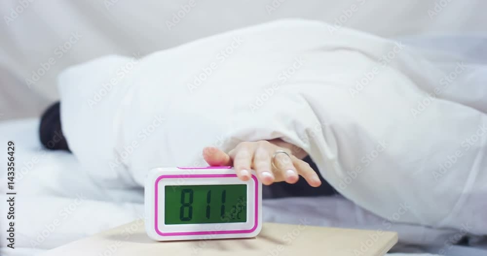 A simple working day for a beautiful young girl sleeping in a warm bed, covered with a soft warm white blanket, on a white background. A simple working day for a beautiful young girl sleeping in a warm bed, covered with a soft warm white blanket, on a white background.