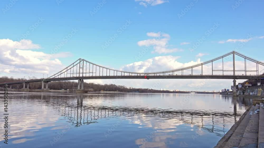 Pedestrian Bridge under the River Dnieper with Clear Blue Sky Pedestrian Bridge under the River Dnieper with Clear Blue Sky