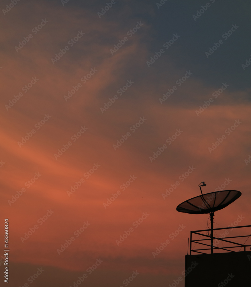 Beautiful Color of Tropical Sunset Sky with the Silhouette of Satellite Dish, Thailand  