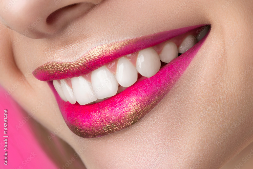 Obraz premium Close up view of beautiful smiling woman lips
