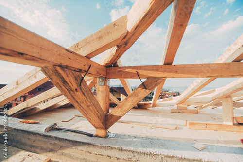 Photography roof construction details. Beams and timber being installed