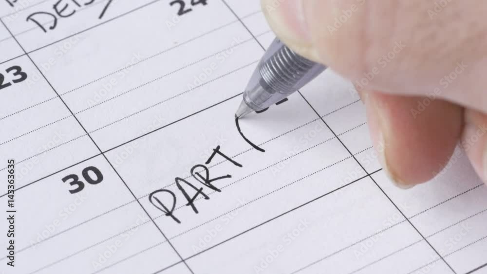 Writing PARTY on a calendar to remember this date. Writing PARTY on a calendar to remember this date.