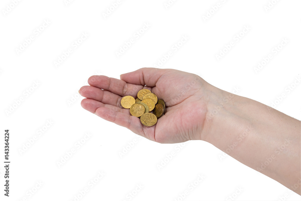 A handful of coins in the hands of an elderly woman A handful of coins in the hands of an elderly woman