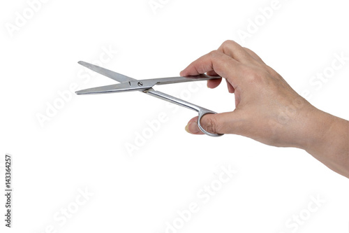 Hand keeps the scissors