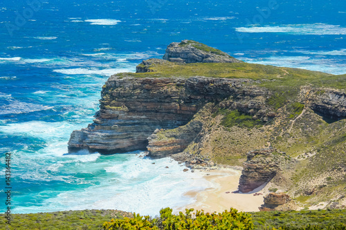 Cape of Good Hope. The Cape of Good Hope (Cape of Storms) is a rocky headland on the Atlantic coast of the Cape Peninsula, South Africa. photo