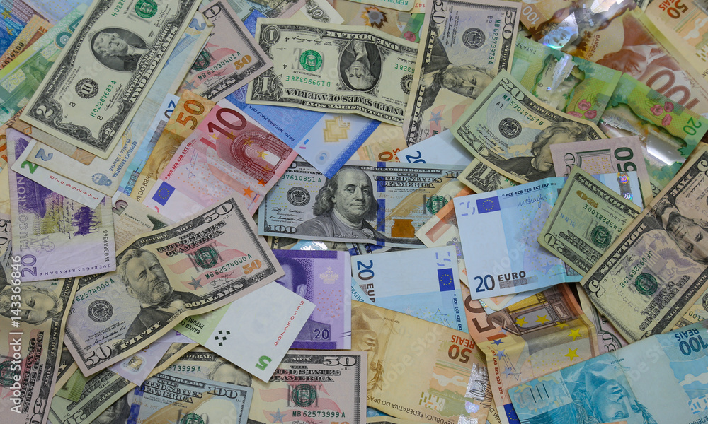 Bank notes from all over the world forming a background