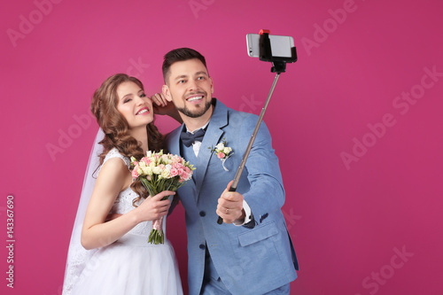 Happy wedding couple making...