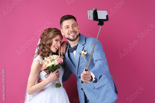 Happy wedding couple making...