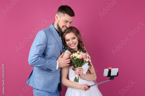 Happy wedding couple making...