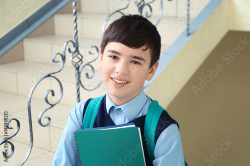 Cute boy in school uniform ...