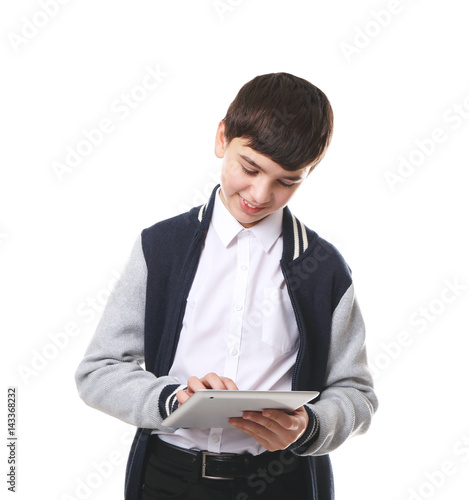 Cute boy in school uniform ...