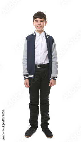 Cute boy in school uniform ...