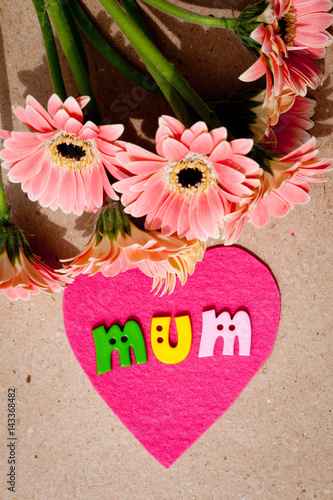 Mother's Day message with flowers on home made paper background - Mum
