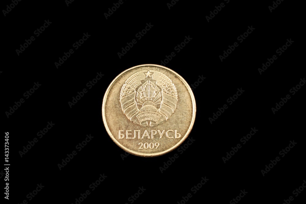 Belorussian ten kopeck coin close up on a black background Belorussian ten kopeck coin close up on a black background