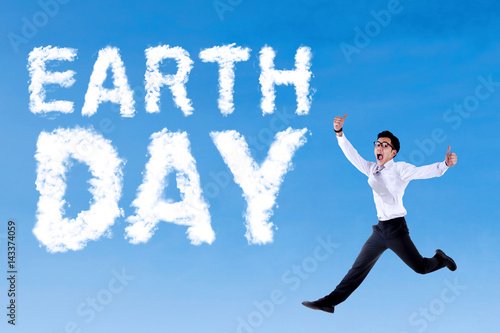 Earth Day text and businessman