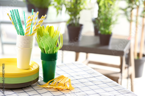 Plastic ware on table outdoors