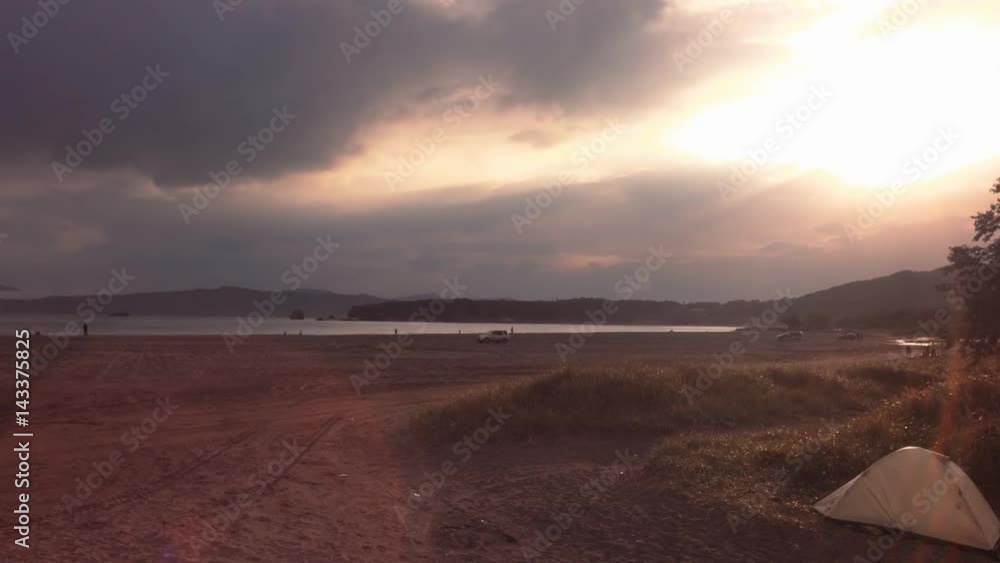 Sanset at Zavoiko Bay in Pacific Ocean on outskirts of city Petropavlovsk-Kamchatsky Timelapse stock footage video Sanset at Zavoiko Bay in Pacific Ocean on outskirts of city Petropavlovsk-Kamchatsky Timelapse stock footage video