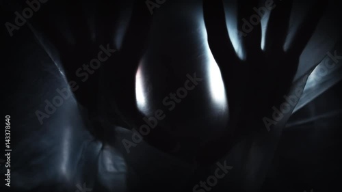 4K Horror Shot Of Hands Silhouette on Plastic Curtain