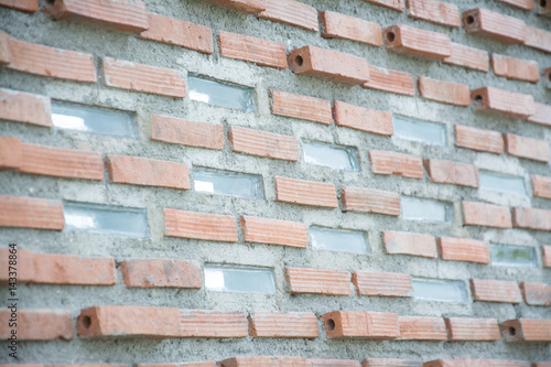 glass with red old brick wall background