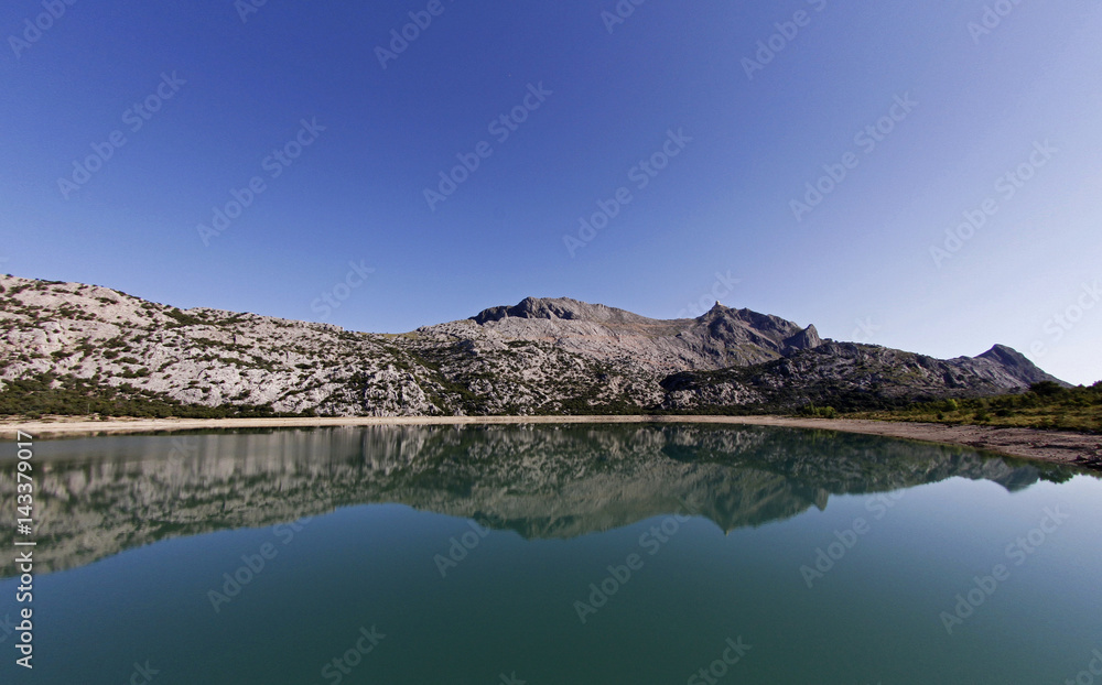 The Cuber water reservoir in the middle of the Tramuntana mountains Unesco world heritage protected area in the Spanish island of Mallorca 