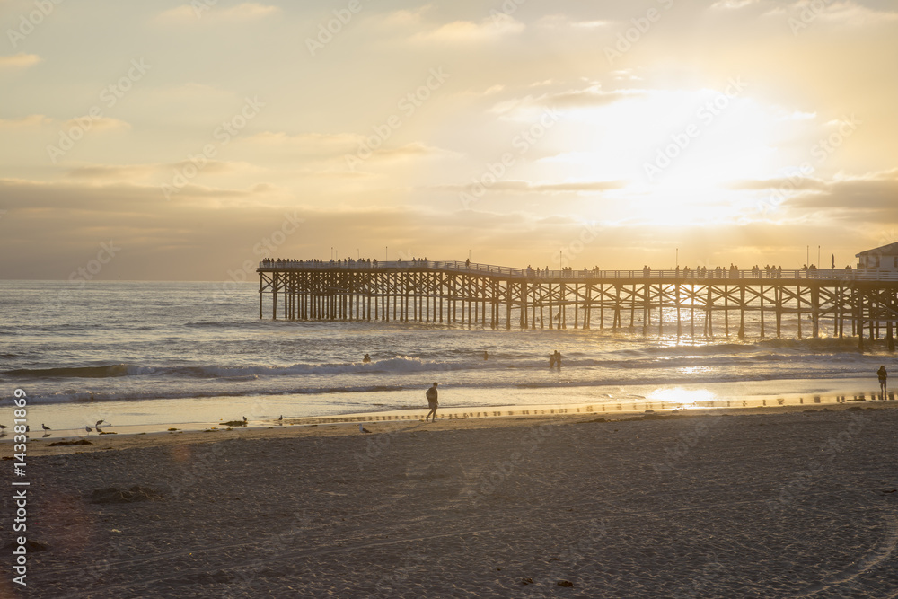 USA, California, San Diego, Beach and pier backlit by sunlight USA, California, San Diego, Beach and pier backlit by sunlight