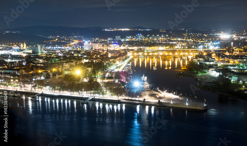 The German Corner (Deutsches Eck) at night at the confluence of Rhine and Mosel rivers in Koblenz with equestrian statue of William I., Germany © chrwittm