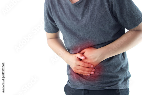 Male stomachache on a white background ,Concept with Healthcare And Medicine. photo