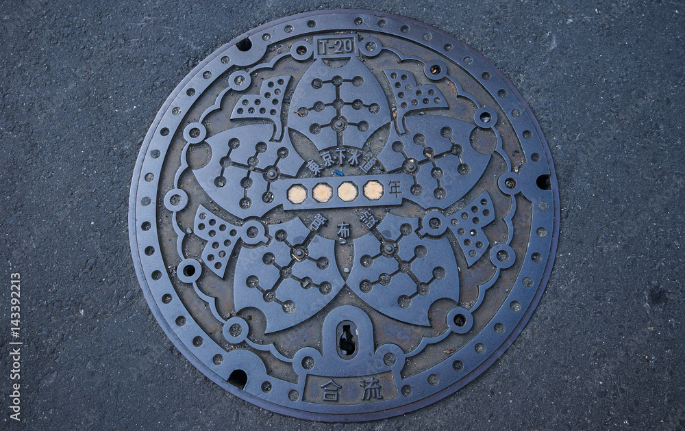 Iron waste drainage cover in Tokyo, Japan. Iron waste drainage cover in Tokyo, Japan.