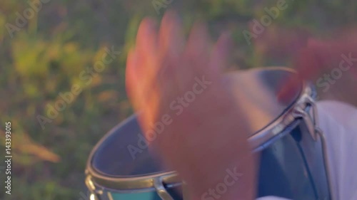 Person playing a caja