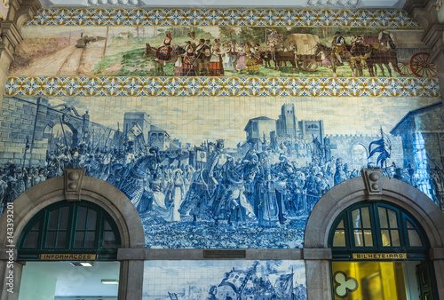 Blue tiles decoration of Sao Bento railway station in Porto city in Portugal photo