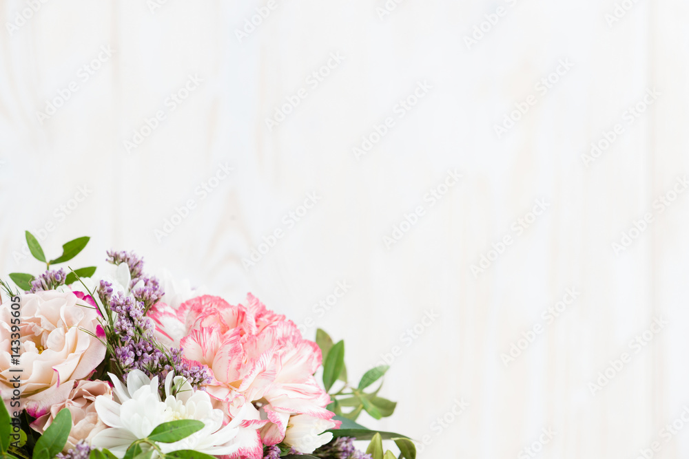 bouquet of flowers on a white wooden background. Copy space bouquet of flowers on a white wooden background. Copy space