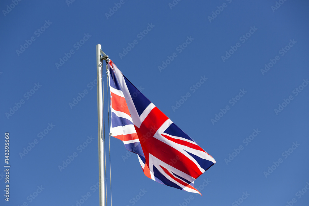UK flag on a flagpole UK flag on a flagpole