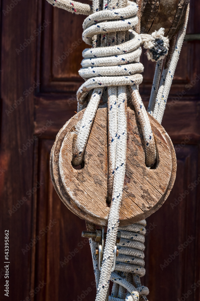 Closeup of pulley and rope on old sailing ship