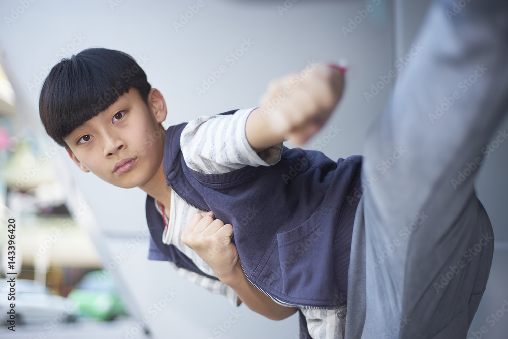 portrait of cool Asian kid posing outdoors portrait of cool Asian kid posing outdoors