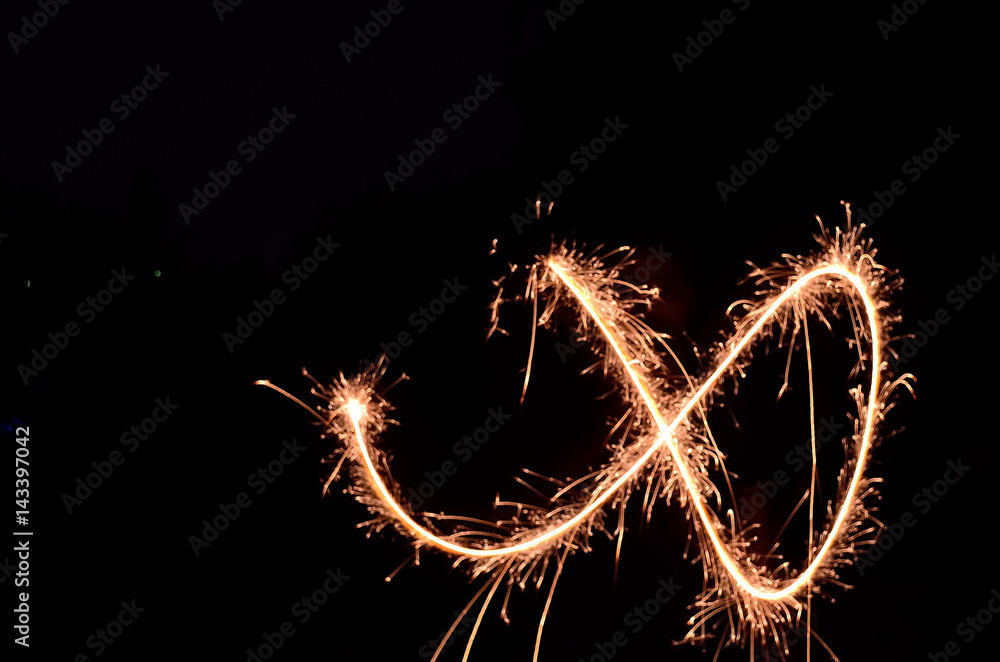 Sparkling fireworks in black background.