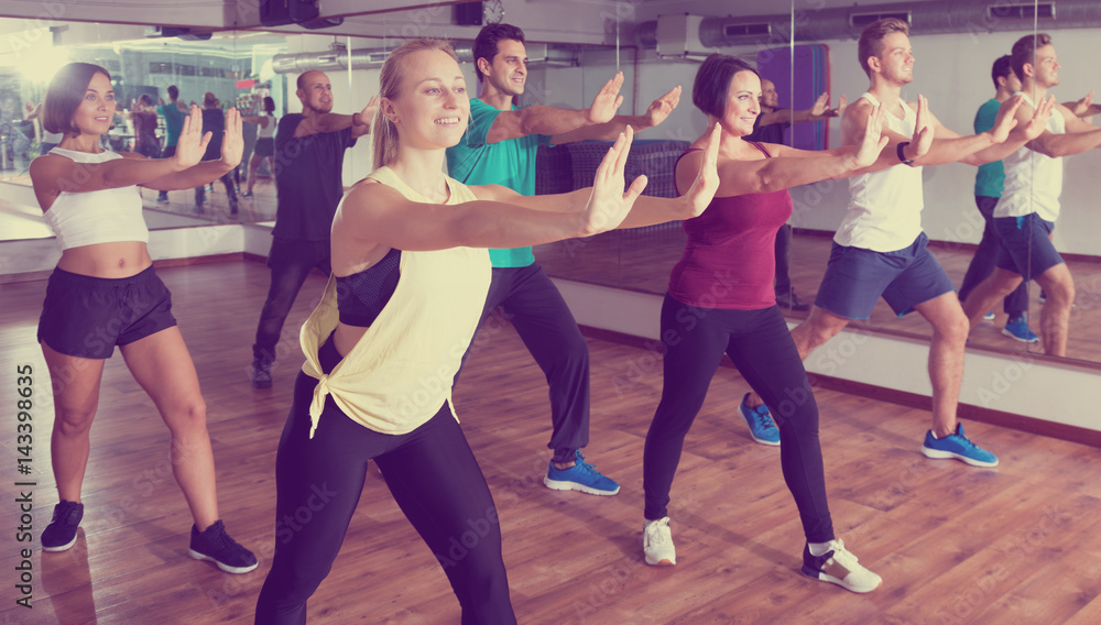 Fototapeta premium Adults having group fitness class