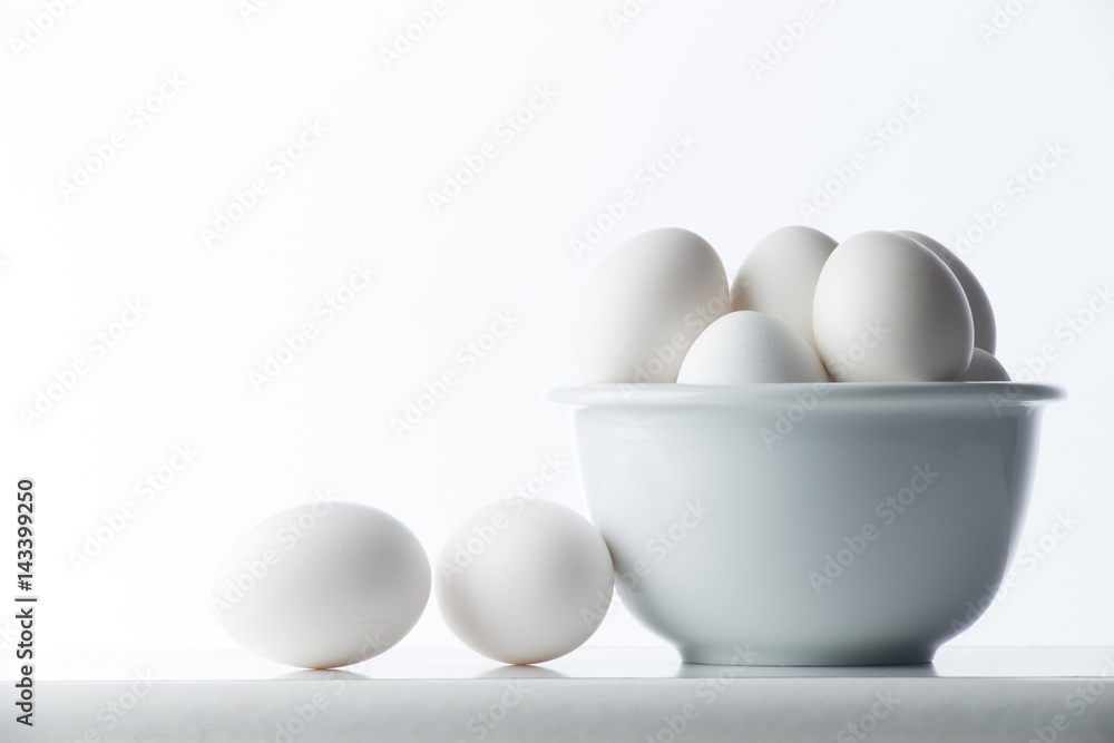 Colored eggs on the white background Colored eggs on the white background