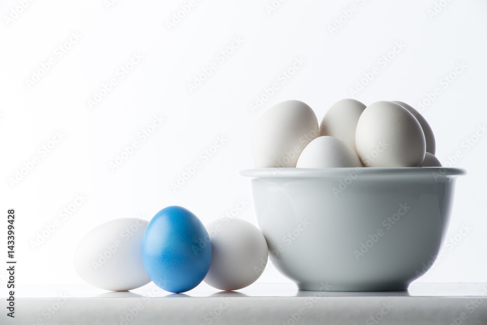 Colored eggs on the white background Colored eggs on the white background