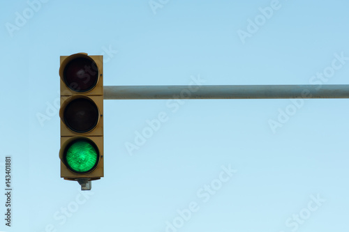 Traffic light on a sky background