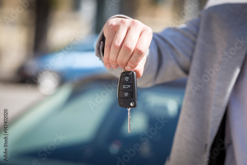 Man hand hold the remote control car alarm systems key © dobok