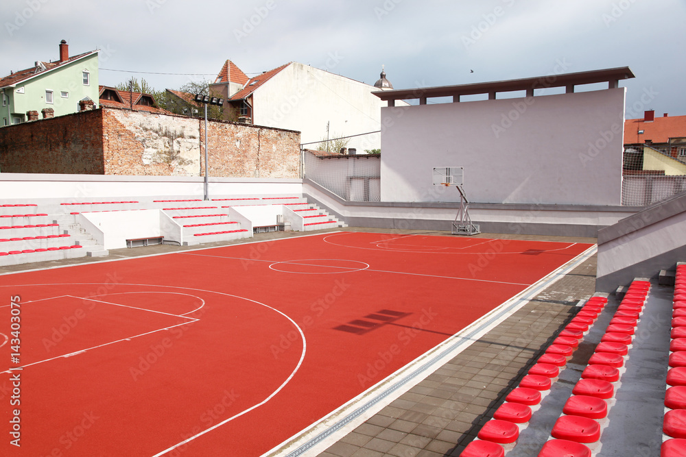 Basketball court outdoor with stands and seats
