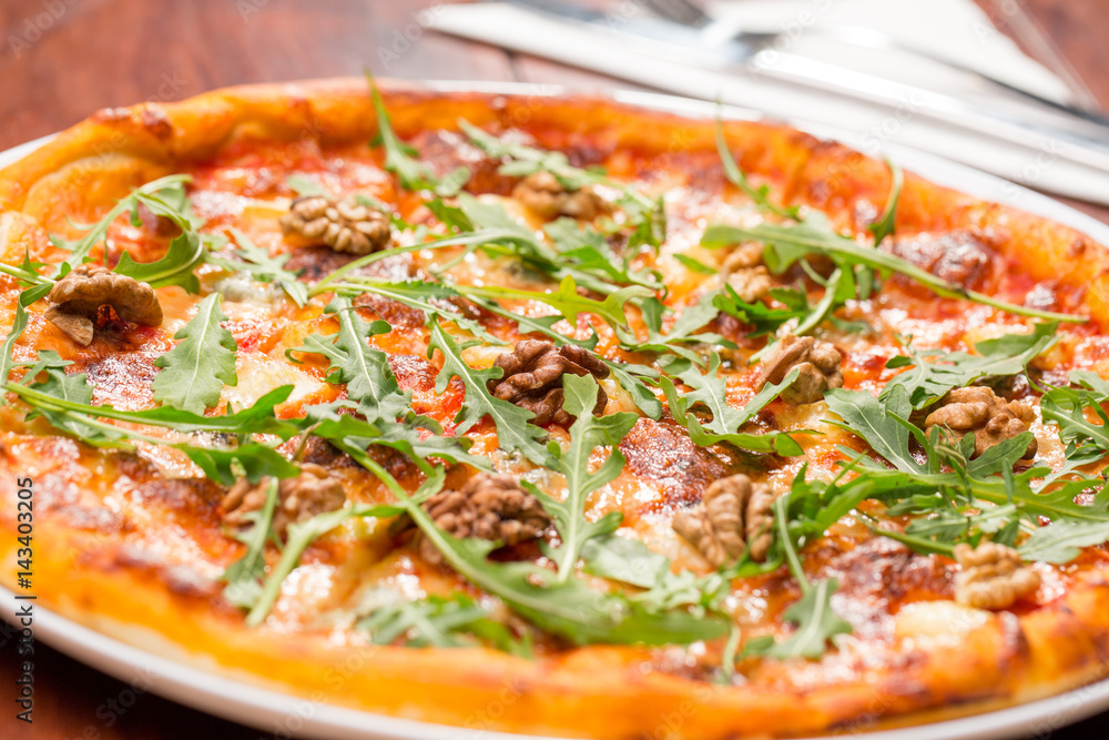 Tasty arugula nuts and blue cheese pizza Tasty arugula nuts and blue cheese pizza