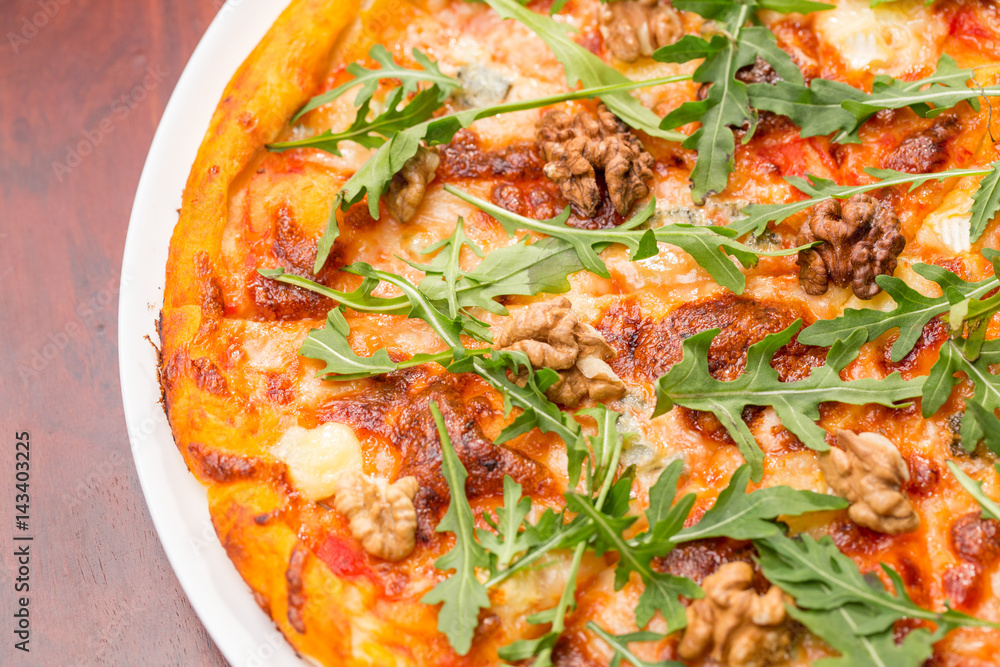 Tasty arugula nuts and blue cheese pizza Tasty arugula nuts and blue cheese pizza