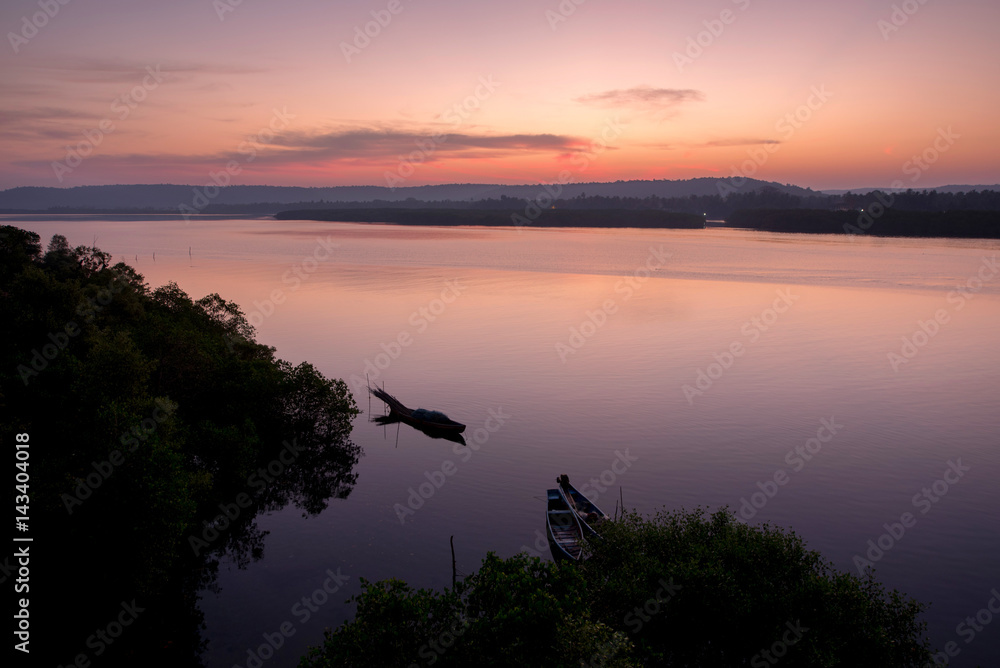 sunrise over the river in India