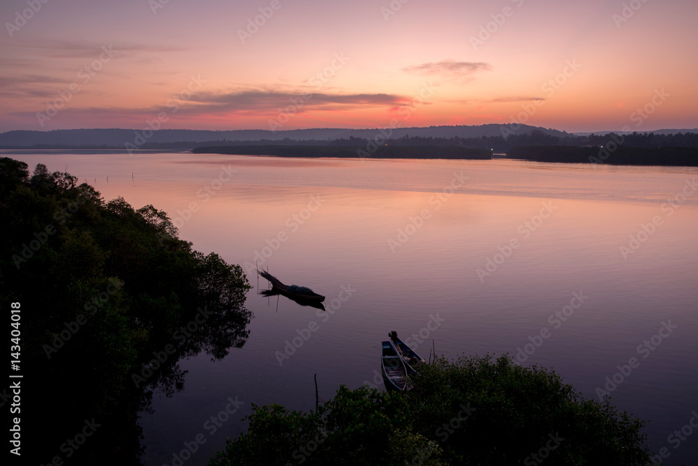 sunrise over the river in India sunrise over the river in India