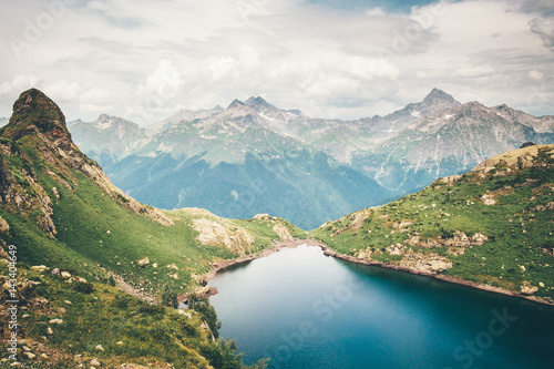 Lake and Mountains range Landscape Summer Travel serene scenic aerial view atmospheric scene.