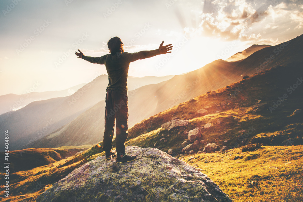 Happy Man raised hands at sunset mountains Travel Lifestyle emotional concept adventure summer vacations outdoor hiking mountaineering harmony with nature - obrazy, fototapety, plakaty 