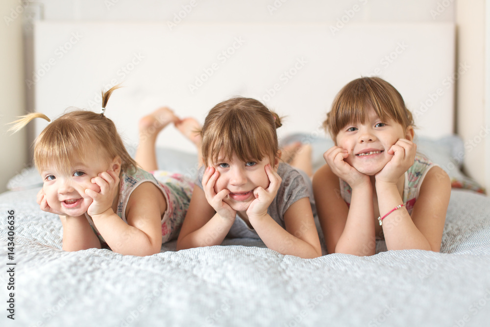 Three sibling sisters in real interior, lifestyle Three sibling sisters in real interior, lifestyle