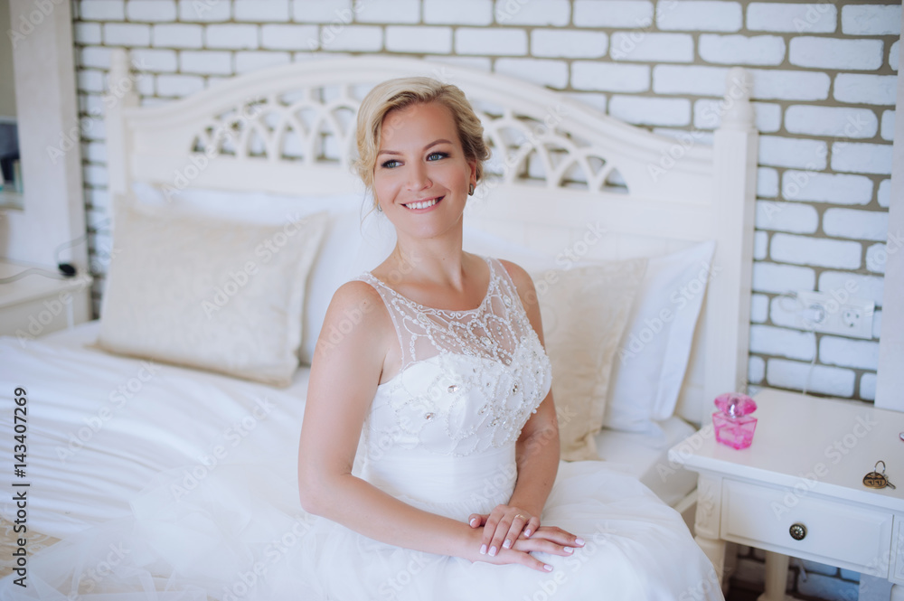 Close up portrait of pretty bride in hotel room. Woman in white dress. Luxury wedding day. Close up portrait of pretty bride in hotel room. Woman in white dress. Luxury wedding day.