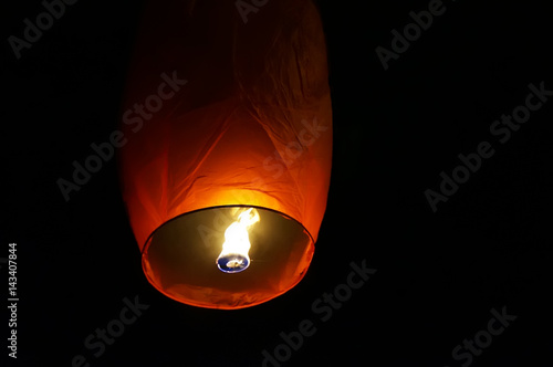 The Chinese lantern flies up highly photo